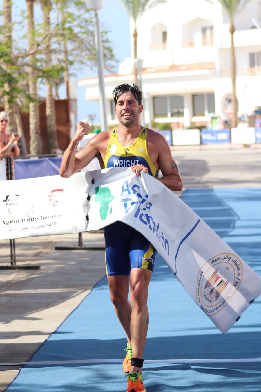 Matthew-Wright-crosses-the-finishing-line-to-win-the-2023-Africa-Triathlon-Cup-Sharm-El-Sheikh-Egypt.